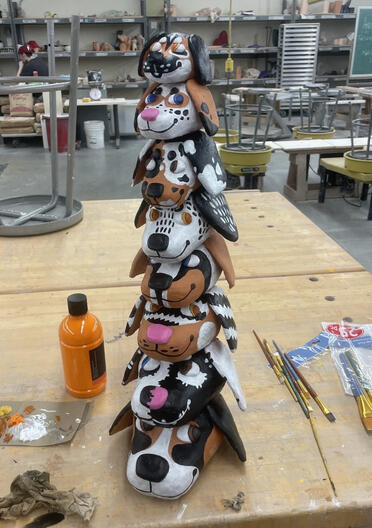 stack of dog heads